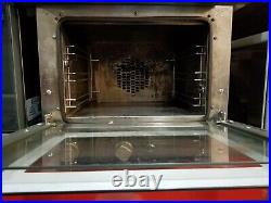 Cadco Quarter Size Countertop Electric Convection Oven with 3 Quarter Size racks