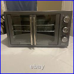 Oster TSSTTVFDMAF 8 in 1 Countertop Convection Toaster Oven Stainless Steel